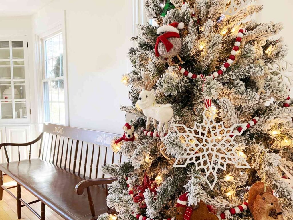 flocked christmas tree decorated